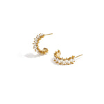 Earrings with zigzag stones