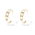 Double hoop earrings with hearts and cubic zirconia stones
