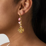 Small hoop earrings with hanging clover, beads and leaves