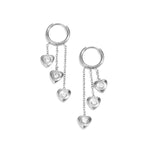 Earrings with dangling hearts at different heights