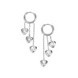 Earrings with dangling hearts at different heights