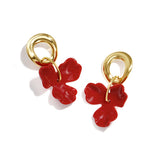 Round earrings with hanging flower