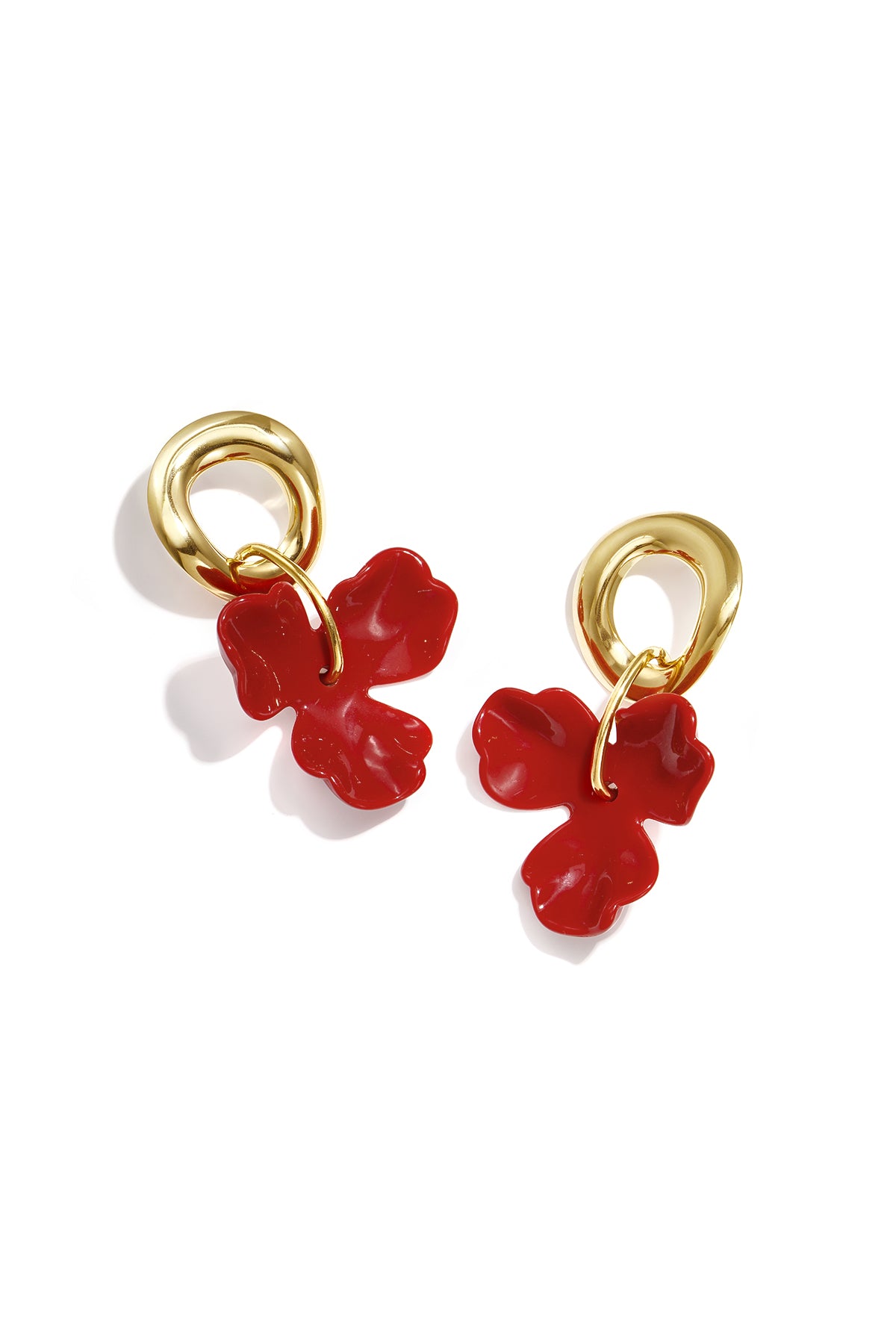 Round earrings with hanging flower