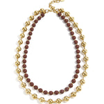 Linked necklace with gold and colored beads