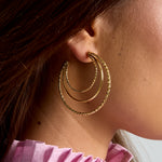Layered triple hoop earrings