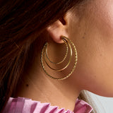 Layered triple hoop earrings