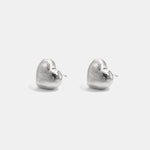 Softly shaped heart stud earrings with a matte effect