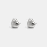 Softly shaped heart stud earrings with a matte effect