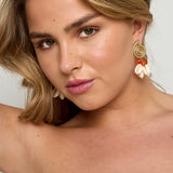 Earrings with shell-shaped pendants and beads