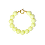 Bracelet with large beads and clasp at the front