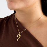 Necklace with covered snake charm