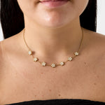 Elegant necklace with zirconia-set flowers