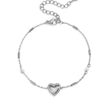 Bracelet with pearl, stone and statement heart