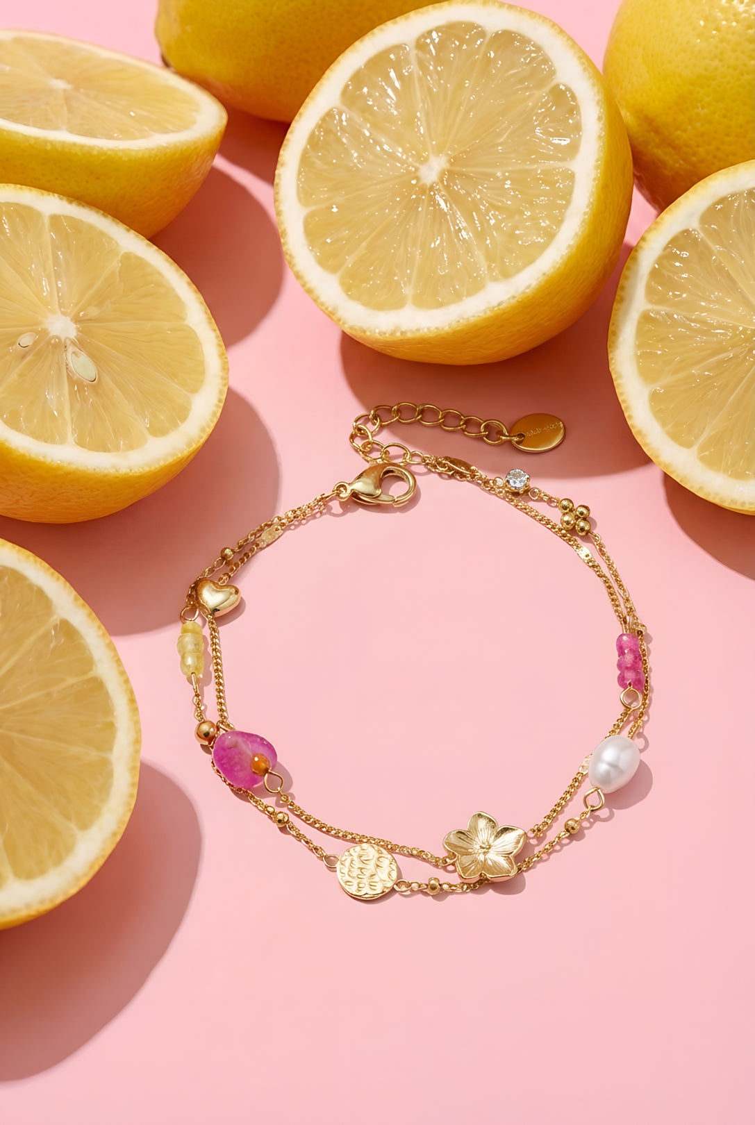 Charm bracelets with stones, beads, and coin