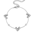 Bracelet with three set hearts and round cubic zirconia stones