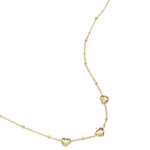 Necklace with beads and hearts with stone