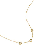 Necklace with beads and hearts with stone