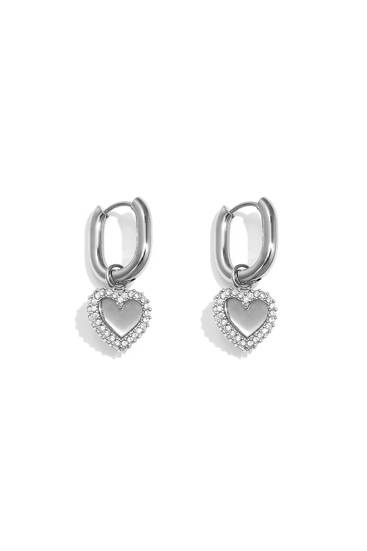 Squoval earrings with heart charms with set edges