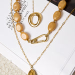 Necklace with beads and front closure design