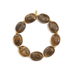 Beaded bracelet with oval and gold beads