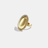 Oval statement ring surrounded by stones