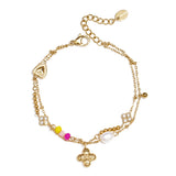 Bracelet with hanging clover, pearl and beads