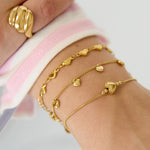Bracelet with small dangling hearts