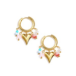 Earrings with dangling beads and heart