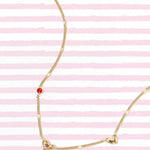 Necklace with hearts stones and pattern