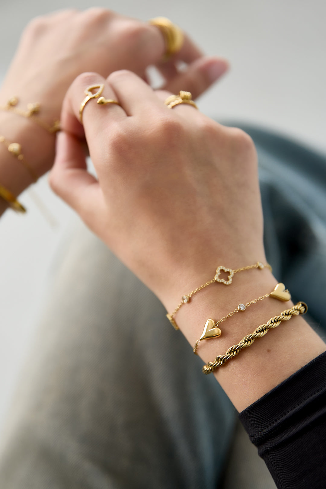 Bracelet with three solid hearts and stones