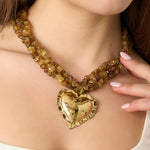 Linked bead necklaces with hanging heart