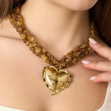 Linked bead necklaces with hanging heart