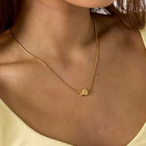 Minimalist necklace with small spiral shell