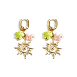 Oval hoop earrings with sun and bead charms