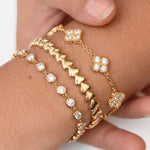 Bracelet with zirconia-set clovers