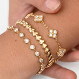 Bracelet with zirconia-set clovers