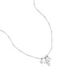 Necklace with cross and star charms