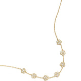 Elegant necklace with zirconia-set flowers