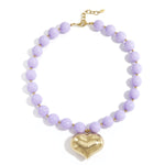 Bead necklace with hanging heart