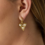 Hoop earrings with hanging heart and pearls