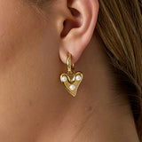 Hoop earrings with hanging heart and pearls