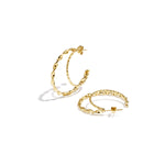 Double hoop earrings with twisted effect