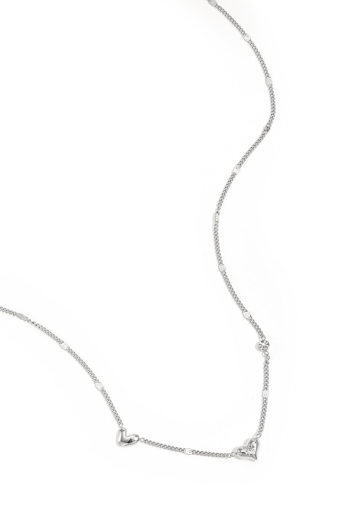 Necklace with hearts stones and pattern