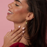 Earrings with structured hanging heart