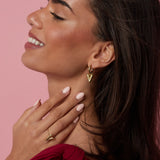 Earrings with structured hanging heart