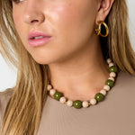 Necklace with beads of different sizes
