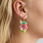 Earrings with a hanging wreath of flowers