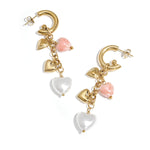 Earrings with dangling heart charms and pearls