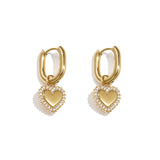 Squoval earrings with heart charms with set edges