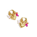 Small hoop earrings with dangling pearls, beads, and a heart